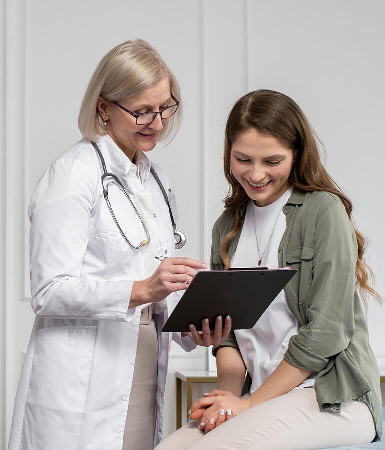 A SAMM provider reviewing a treatment plan with a patient
