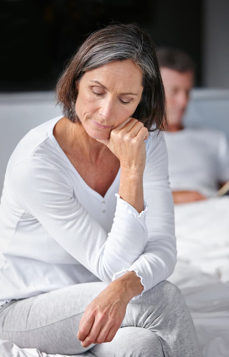 A woman reflecting on changes to her intimacy and wellness