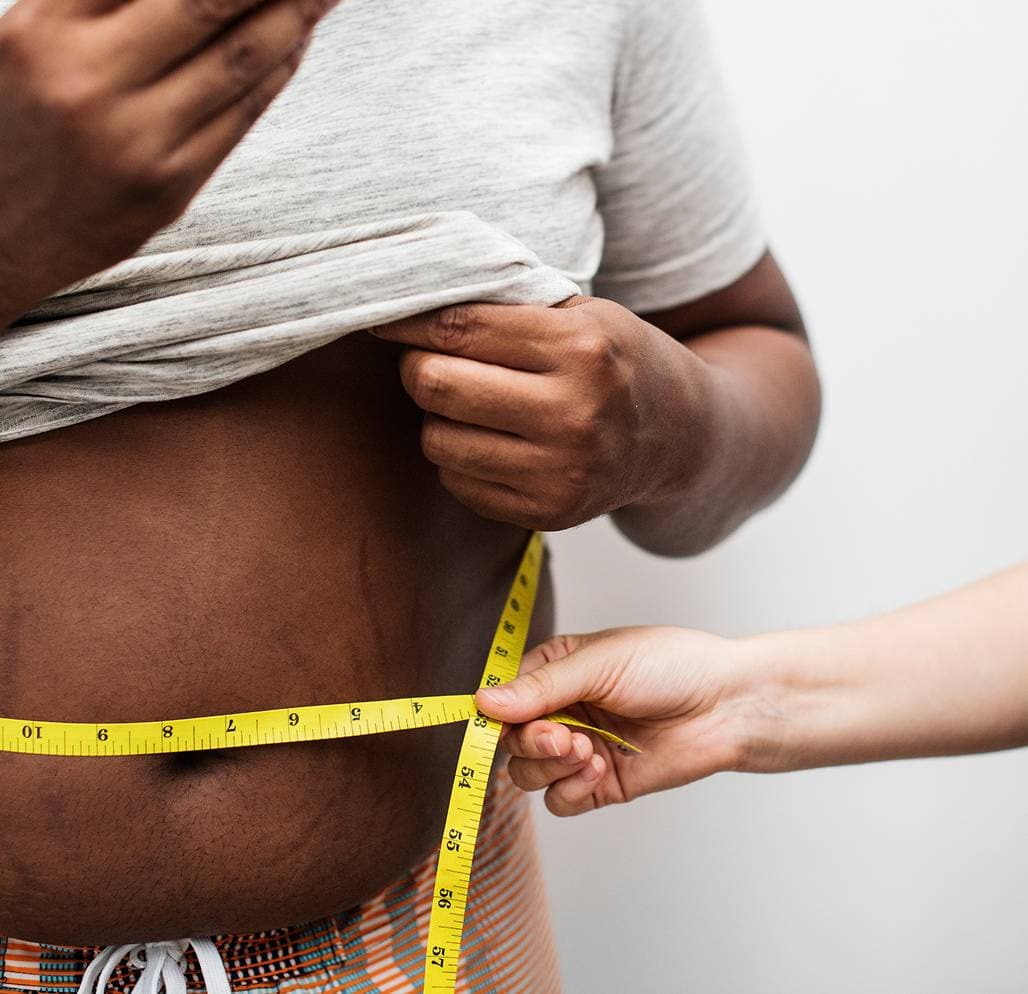 A patient discussing their weight loss goals with a provider