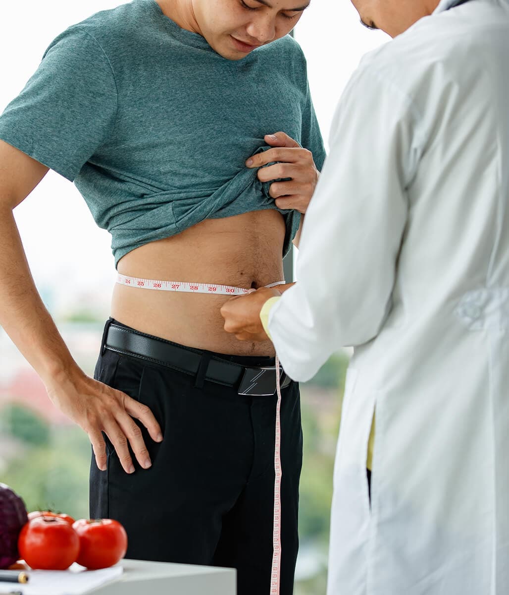 A provider reviewing a patient’s measurements during a check-in